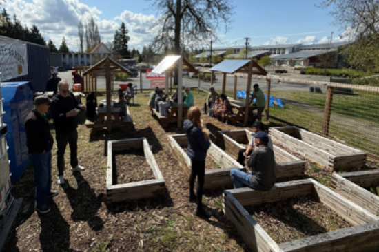 Picture of members working in the community garden